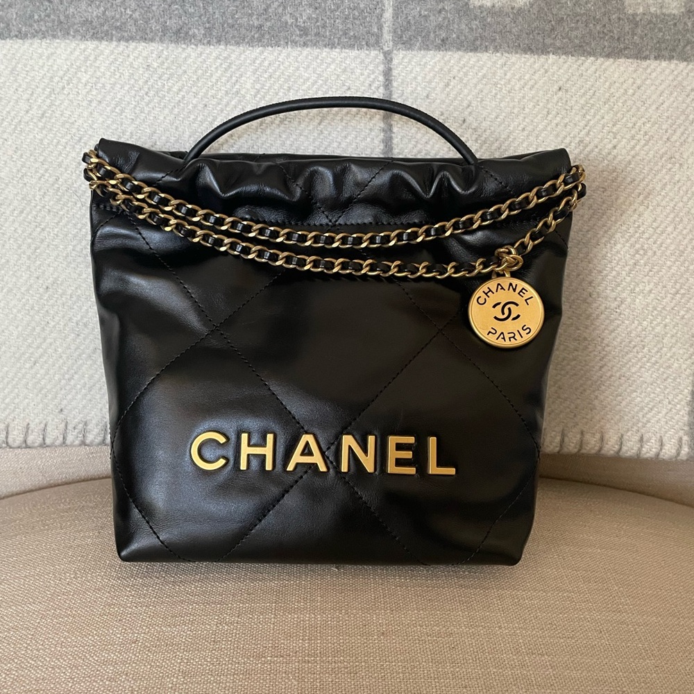 SOLD - Chanel 22 Mini black crossbody shoulder bag with gold hardware